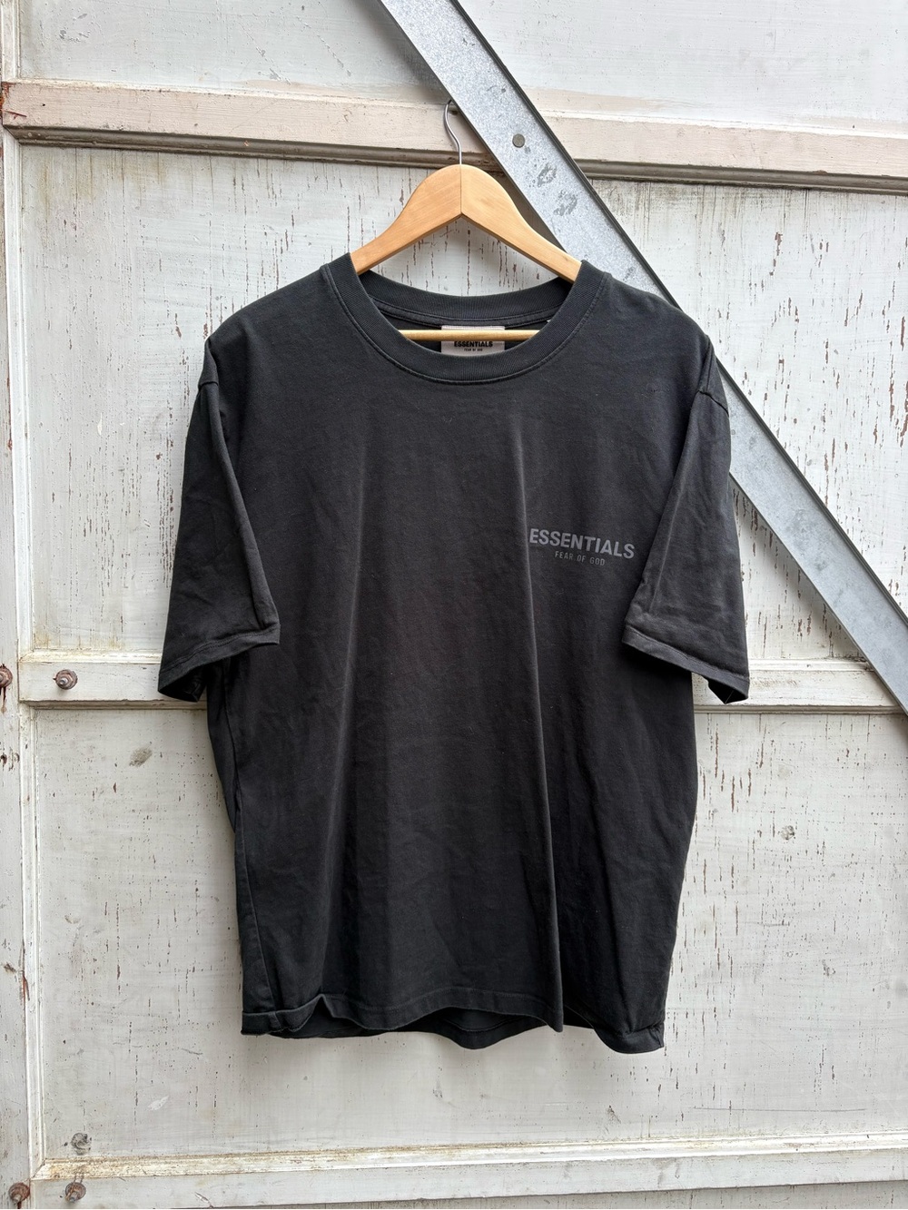 Fear of God ESSENTIALS Men’s Black Short Sleeve Spell Out Logo Shirt M